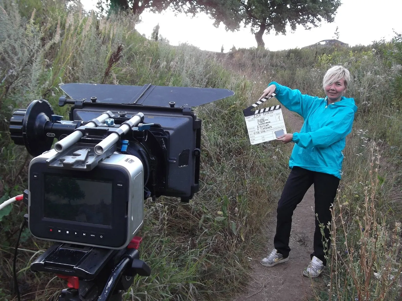 A close view of a cinema camera on an outdoor shoot